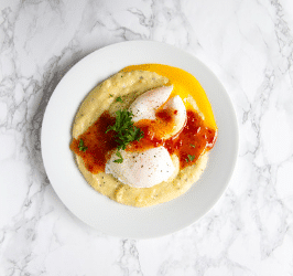 Poached Eggs and Polenta with Spicy Chili Sauce