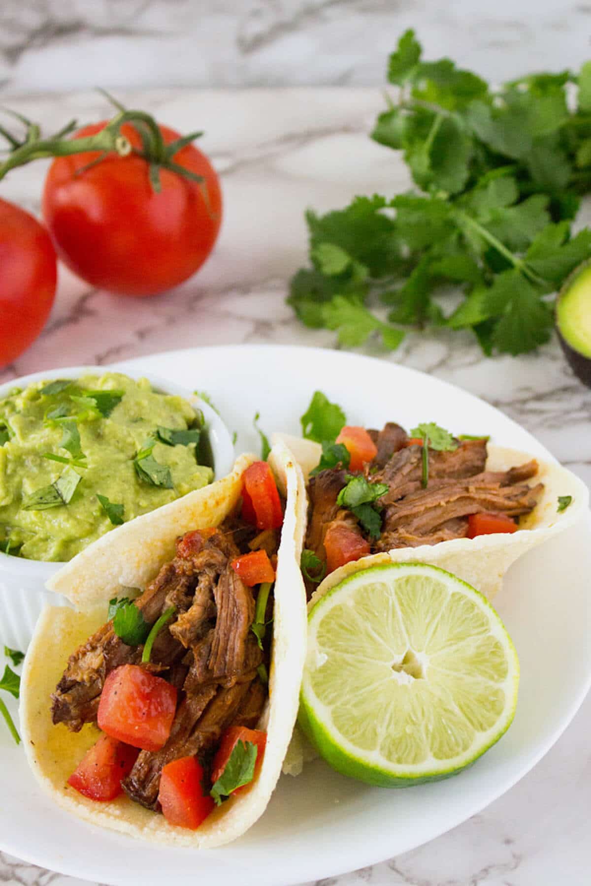 Green Chili Beef Burritos w/ Guacamole
