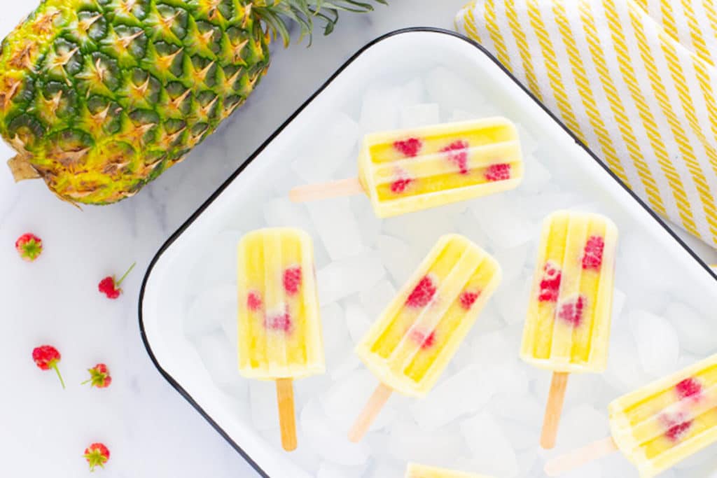 Whole Fruit Popsicles with Pineapple and Raspberries